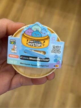 Mini Squish Mystery Dumpling Toy - Beige Case with Blue Label